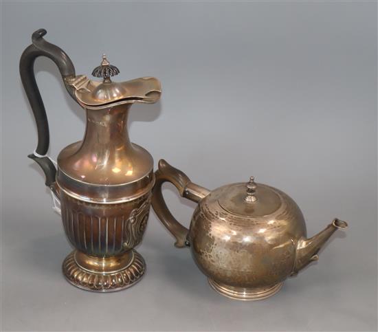 An Edwardian demi fluted hot water pot and a Scottish planished silver bullet shaped teapot, Glasgow, 1935.